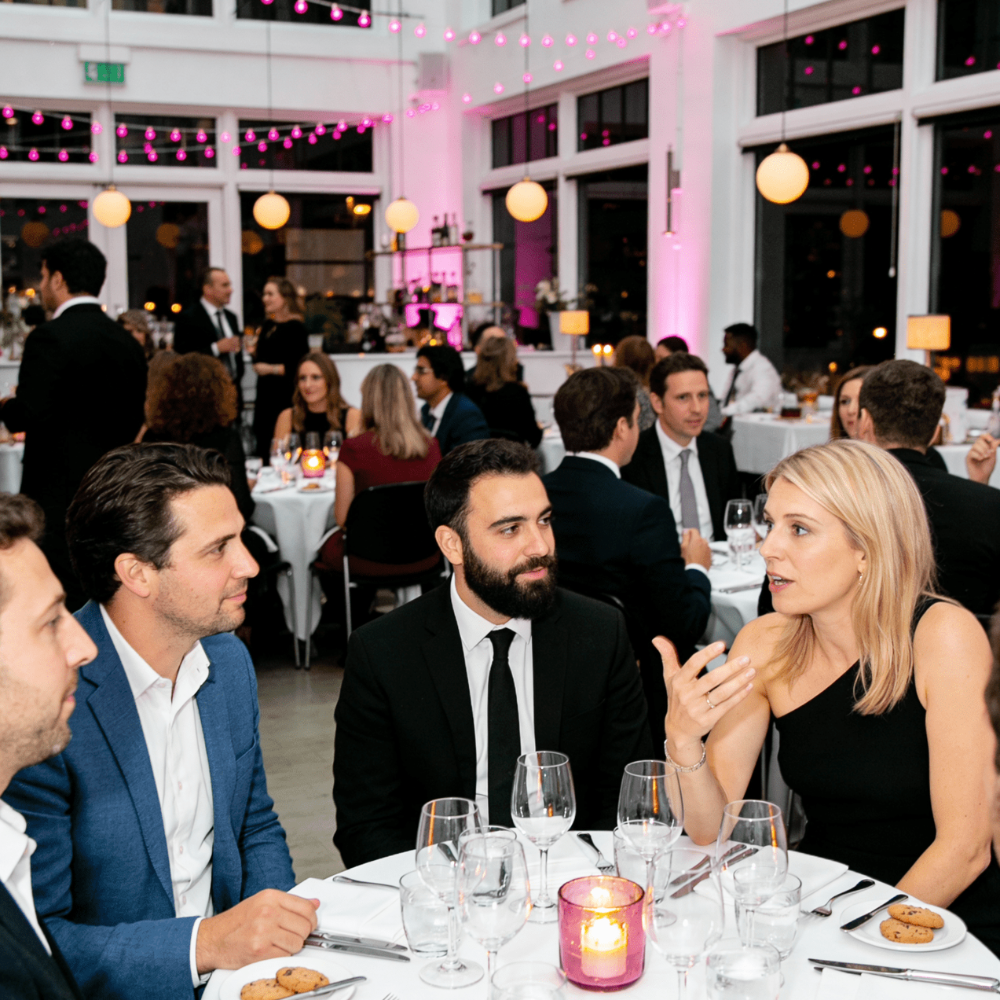 Guests in conversation at a Convene X executive dinner